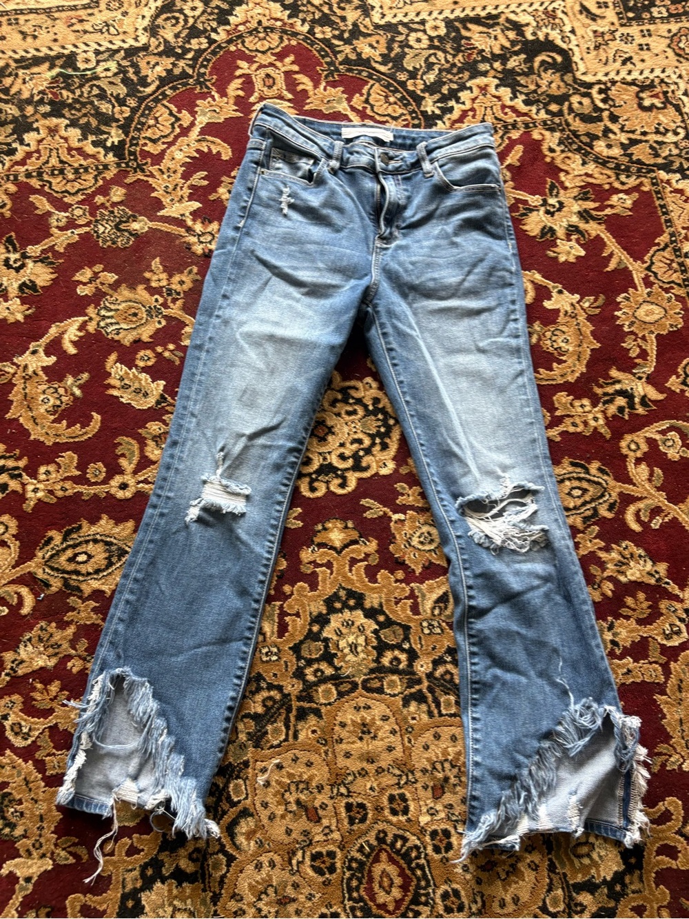 Distressed Light Blue Cropped Women's Jeans with Frayed Hem